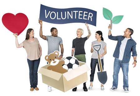 Happy diverse people holding volunteer banner