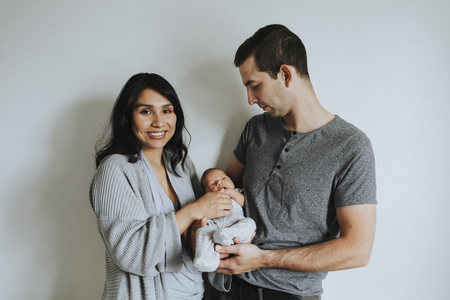 Portrait of a young happy family