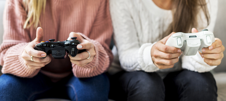 Women playing video game together