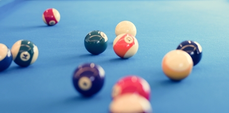 Billiard balls on a pool table