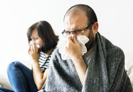 Couple sick together at home