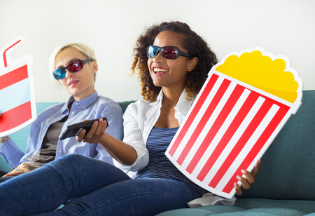 Young women watching three dimensional movie