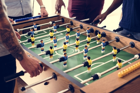 People playing table football