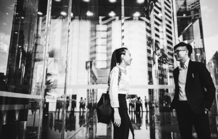 Asian business people in a city