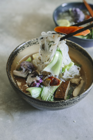 Vegan noodle soup with tofu food photography recipe idea