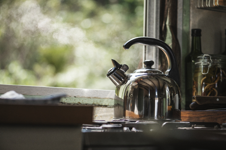 Teapot on a gas stove in the kitchen