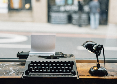 Retro typewriter with a piece of paper