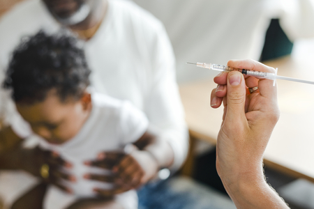 Baby getting a first injection