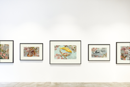 Collection of art pieces on a wall