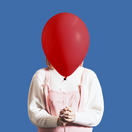 Woman with a single balloon