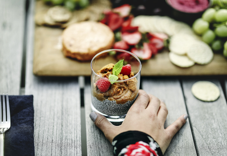 Woman having a vegan chia pudding