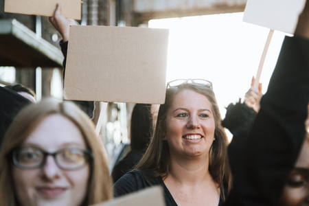 Happy activists marching through the city