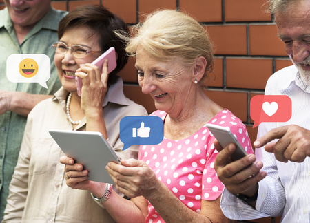 Diverse elderly using digital devices