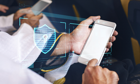 Businessman logging in to his phone
