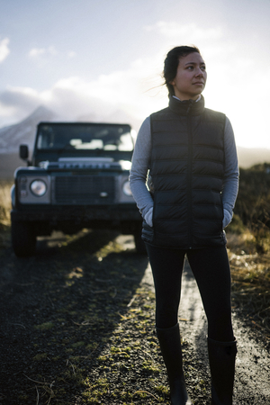 Woman parking her car at Glen Etive, Scotland