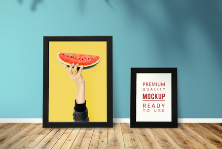 Art frame mockup against a green wall
