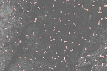 Pink confetti on a gray marble textured background