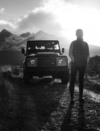 Woman parking her car at Glen Etive, Scotland