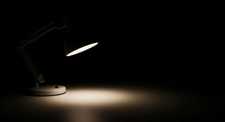 Table lamp on a black background. Table lamp on a black backgroundの素材