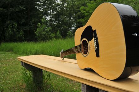 Guitar Resting On Benchの写真素材