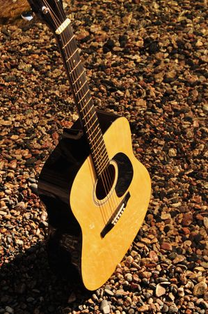 Creek Bed Of Stones Guitar In Nature