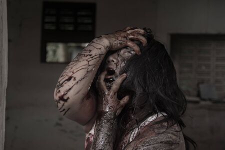 Zombie girl in haunted house scaryの写真素材