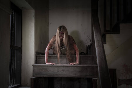 Zombie girl in haunted house scaryの写真素材
