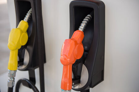 Colorful fuel oil gasoline dispenser at petrol filling station