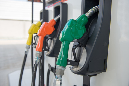 Colorful fuel oil gasoline dispenser at petrol filling stationの写真素材