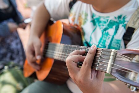 Playing guitar during the holidays.の写真素材