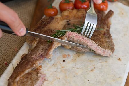 Steak Ribeye on Himalayan pink salt block on background, beautiful.の写真素材