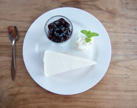 The Blueberry Cheesecake on a white plateの写真素材