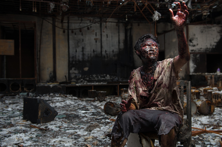 Spooky, creepy zombie in clothes, The scary zombie who gets burned,Man who burned the Horror of a in the pub.の写真素材