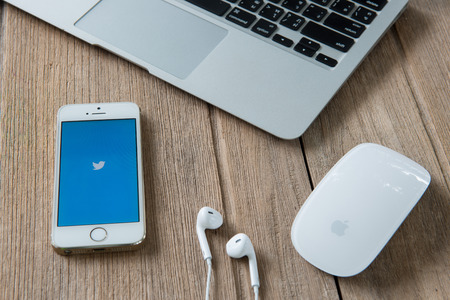 CHIANGMAI, THAILAND -JUNE 22, 2015:Twitter is an online social networking and microblogging service that enables users to send and read "tweets"のeditorial素材