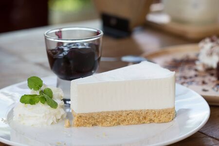 The Blueberry Cheesecake on a white plateの写真素材