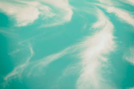 blue sky background with tiny clouds,clouds in the blue sky,Blue sky.の写真素材