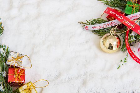 Christmas background with red bauble,snow and snowflakes,Christmas teamの写真素材