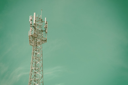 GSM cell transmission station and summer landscape with cloudy sky,Cellulartower,Telecommunications equipmentの写真素材
