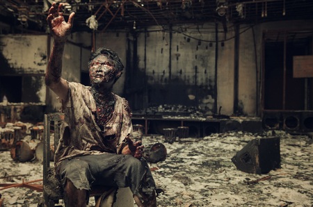 Spooky, creepy zombie in clothes, The scary zombie who gets burned,Man who burned the Horror of a in the pub.の写真素材