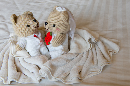 bear doll in love, Toy bears with wedding, two teddy bears on the bed.の写真素材