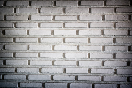 Background of brick wall texture of old vintage brick wallの写真素材