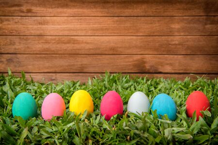 Easter eggs on wooden background