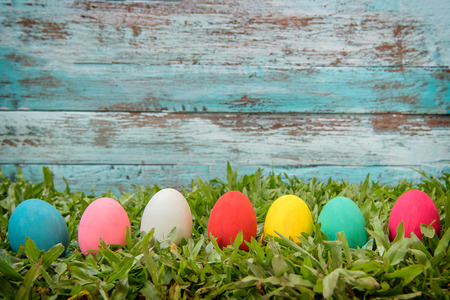 Easter eggs on wooden background