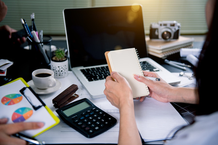 Business team meeting. Photo professional investor working new start up project. Finance task.Digital tablet docking keyboard laptop computer smart phoneの写真素材