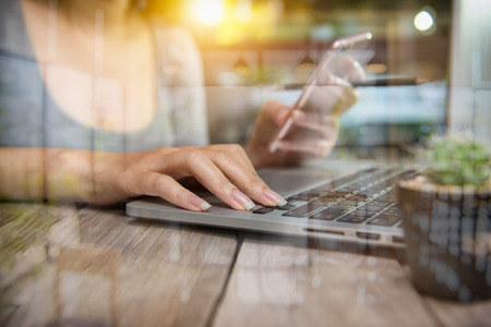 Young businesswoman hand with mobile network communication technology, wireless internet application development Multichannel online banking payment communication network digital technologyの写真素材