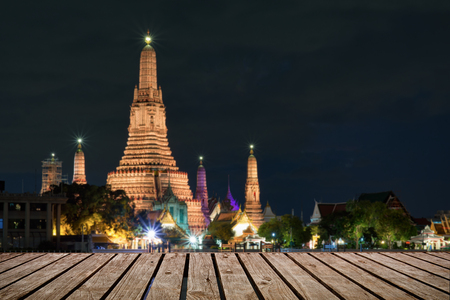 Opening wooden floor, Twilight at Arun temple river front, Thailand Landmarkの写真素材