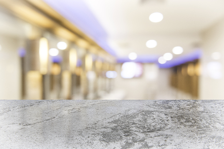 White marble table top on blur coffee shop window background. For product or foods montage.の写真素材