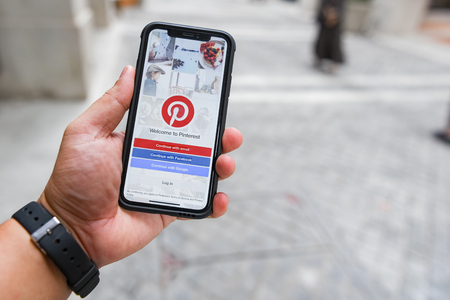 CHIANGMAI, THAILAND - JAN 08,2018 :Brand new Apple iphone X with social Internet service Pinterest on the screen. iPhoneX was created and developed by the Apple inc.のeditorial素材