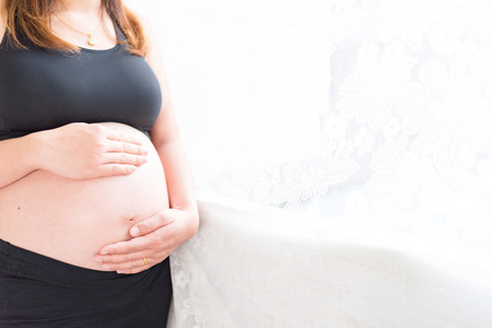 Cropped image of beautiful pregnant woman