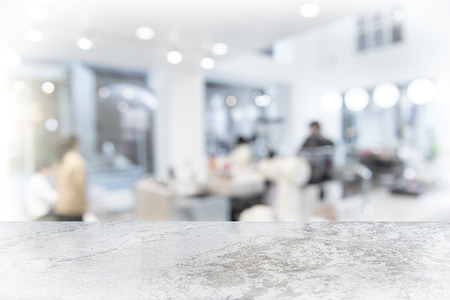 White marble table top on blur coffee shop window background. For product or foods montage.の写真素材